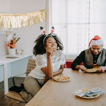 Woman and man eating - stick to a Healthy Diet This Festive Season