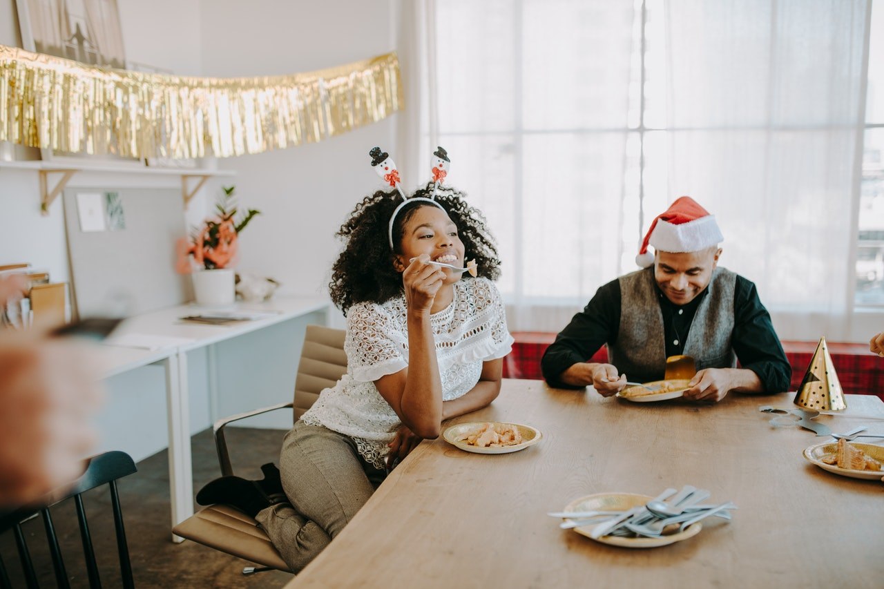 Woman and man eating - stick to a Healthy Diet This Festive Season